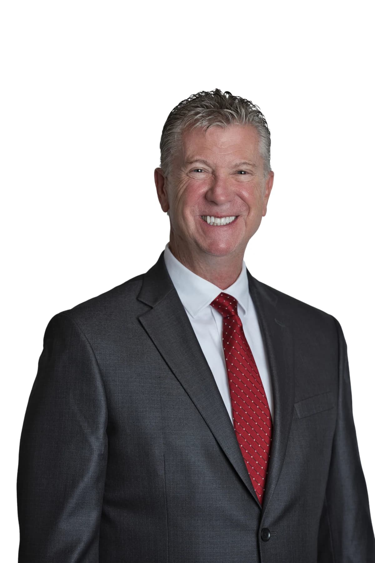 Bob Crews in a dark suit and red tie